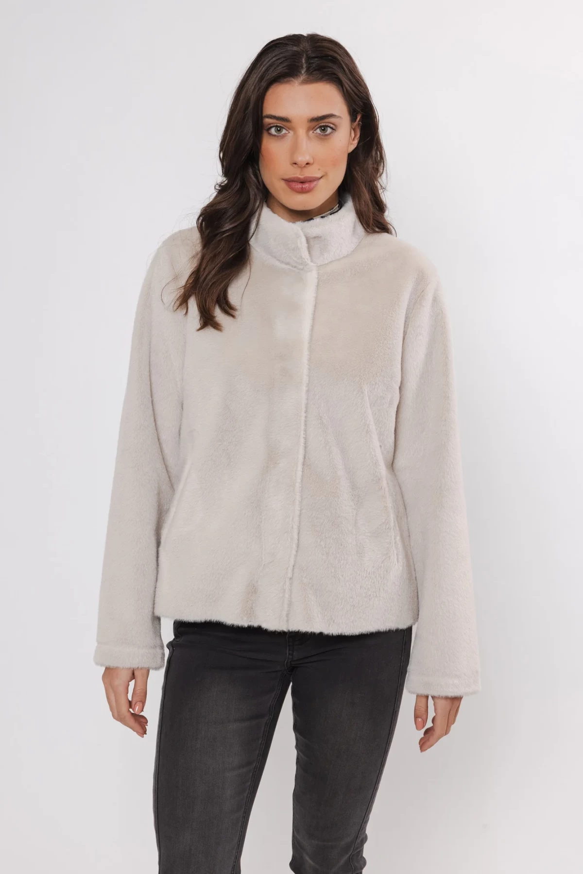 Short eco-fur jacket with a soft suede lining.Three colors - camel , off white and black